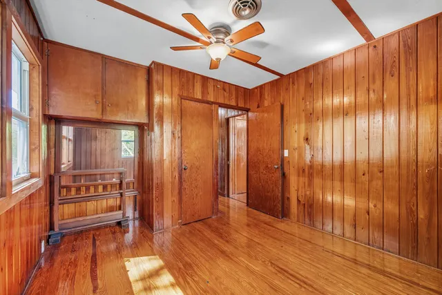 wooden floor and windows in a room