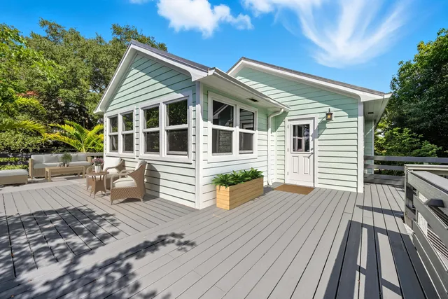 a front view of a house with barbeque oven