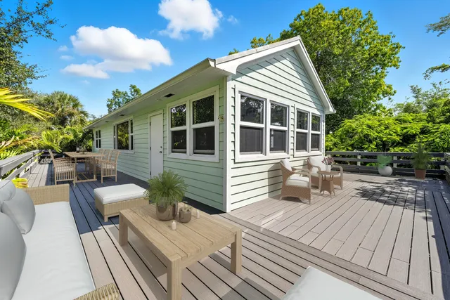 a view of house with patio outdoor seating