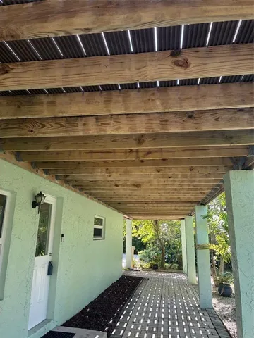 a view of a backyard of the house