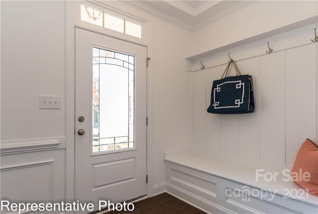 2153 Bexar Trail Matthews, NC 28105 - Photo 3 of 35 a view of a hallway with closet and a window