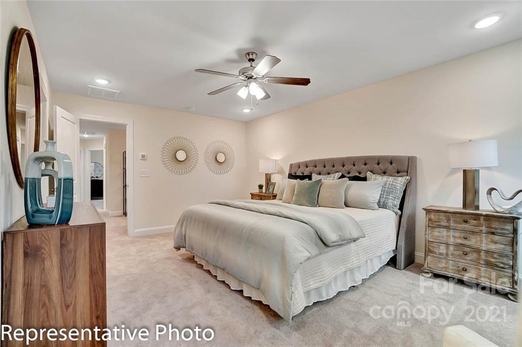 2153 Bexar Trail Matthews, NC 28105 - Photo 28 of 35 a bedroom with bed and window