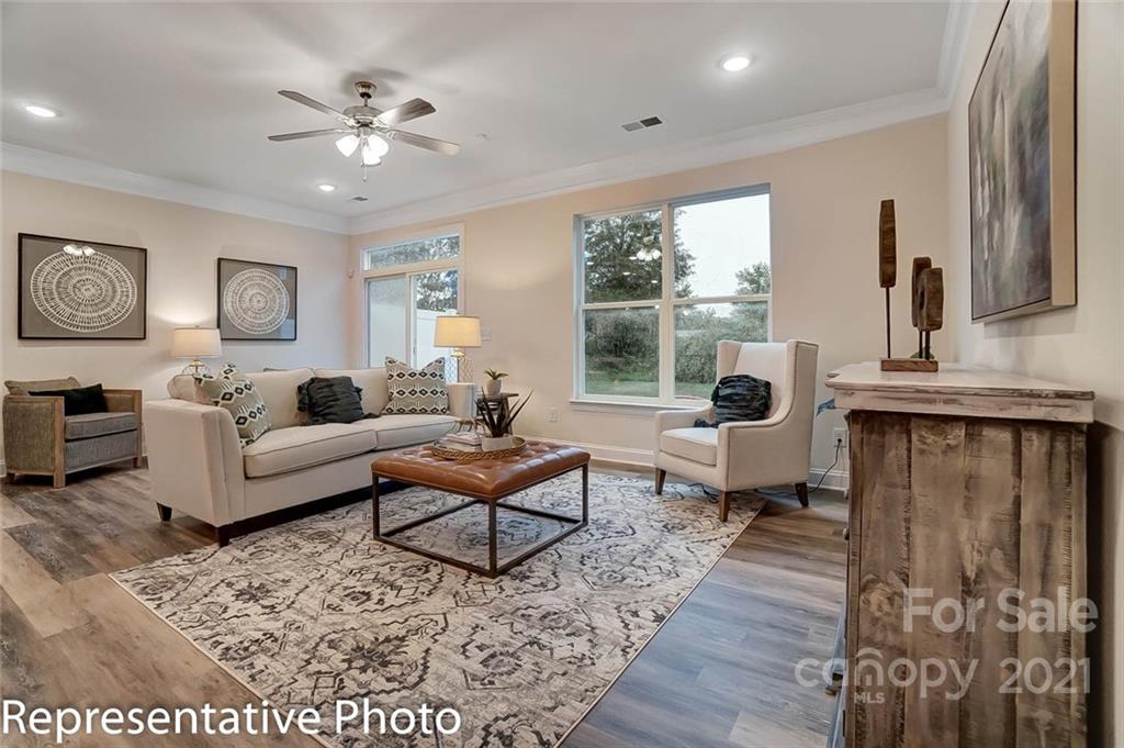 2153 Bexar Trail Matthews, NC 28105 - Photo 5 of 35 a living room with furniture and a large window