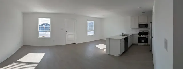 a view of an empty walk in closet