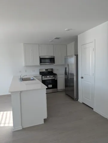 an empty room with a workbench