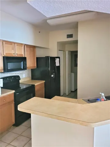 $269,000 | 9833 Baywinds Boulevard, Unit 7203, West Palm Beach, FL 33411