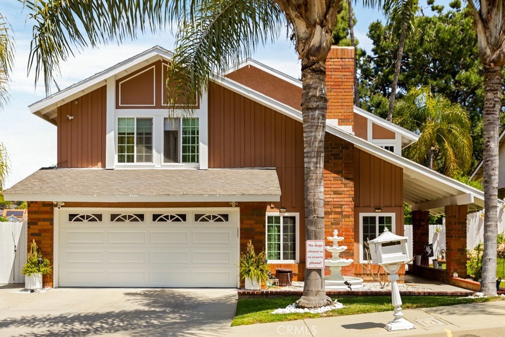 1644 Bears Den Road Diamond Bar, CA 91765 - Photo 1 of 1 a front view of a house with garden