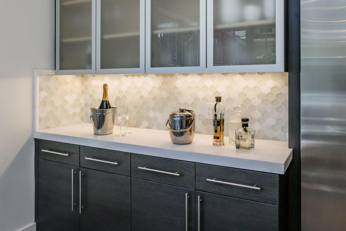 421 Hillcrest Road San Mateo, CA 94402 - Photo 11 of 33 a bathroom with a sink and a mirror