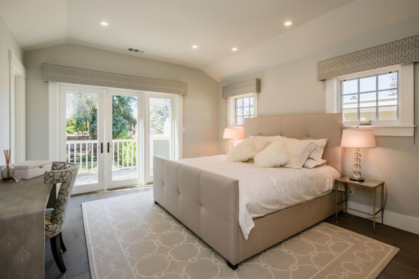 421 Hillcrest Road San Mateo, CA 94402 - Photo 16 of 33 a bed room with a bed and a chair