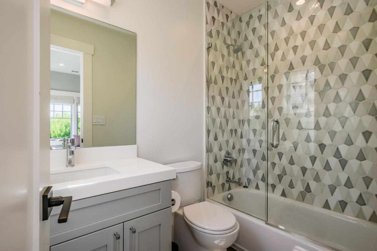 421 Hillcrest Road San Mateo, CA 94402 - Photo 23 of 33 a bathroom with a sink a toilet and shower
