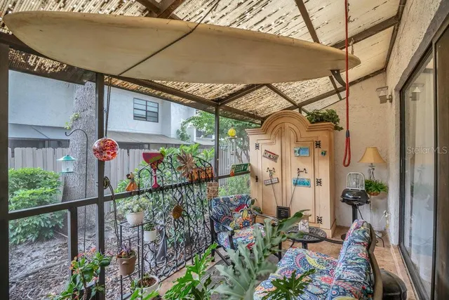 a view of a house with a flower garden