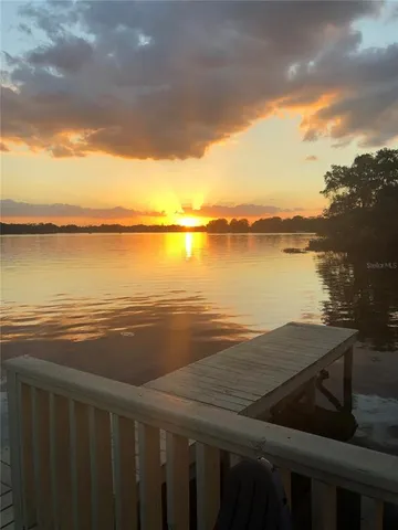 a view of a lake from a balcony
