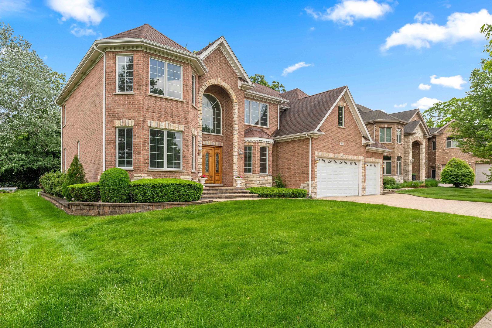 281 Forest Drive Addison, IL 60101 - Photo 2 of 14 a front view of a house with a yard