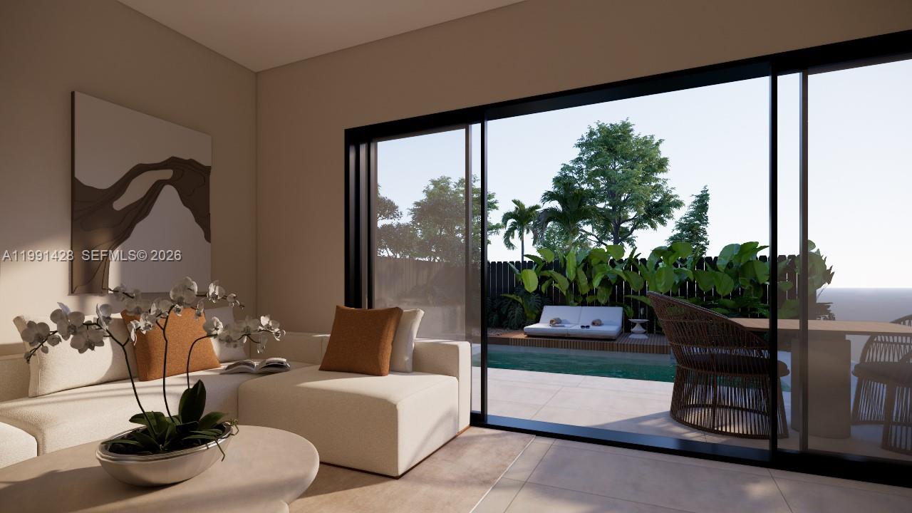 3021 Southwest 27th Street Miami, FL 33133 - Photo 18 of 40 a living room with furniture and a floor to ceiling window