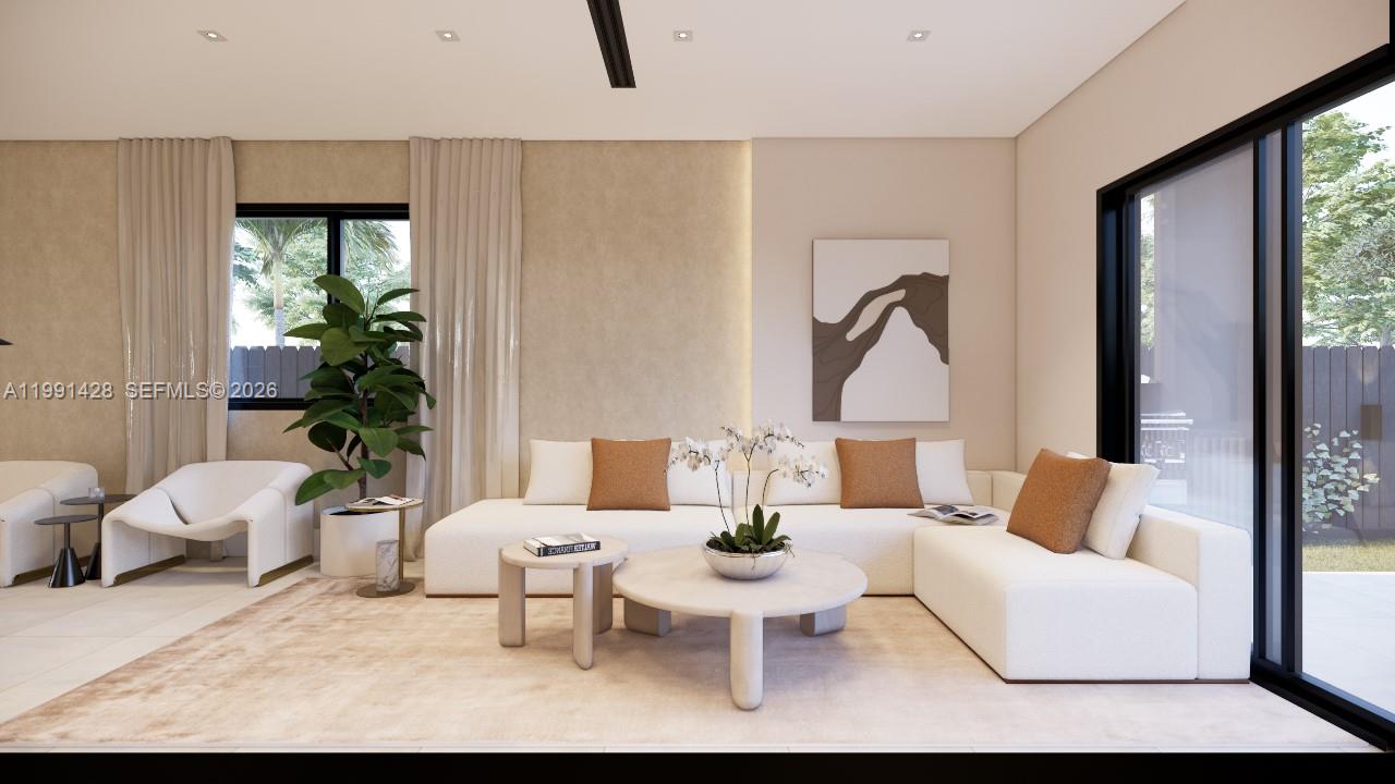 3021 Southwest 27th Street Miami, FL 33133 - Photo 8 of 40 a living room with furniture and a large window