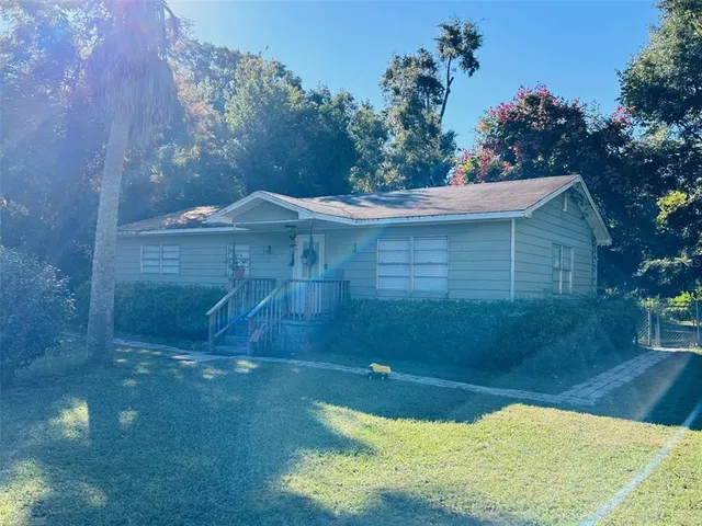 a view of a backyard of a house