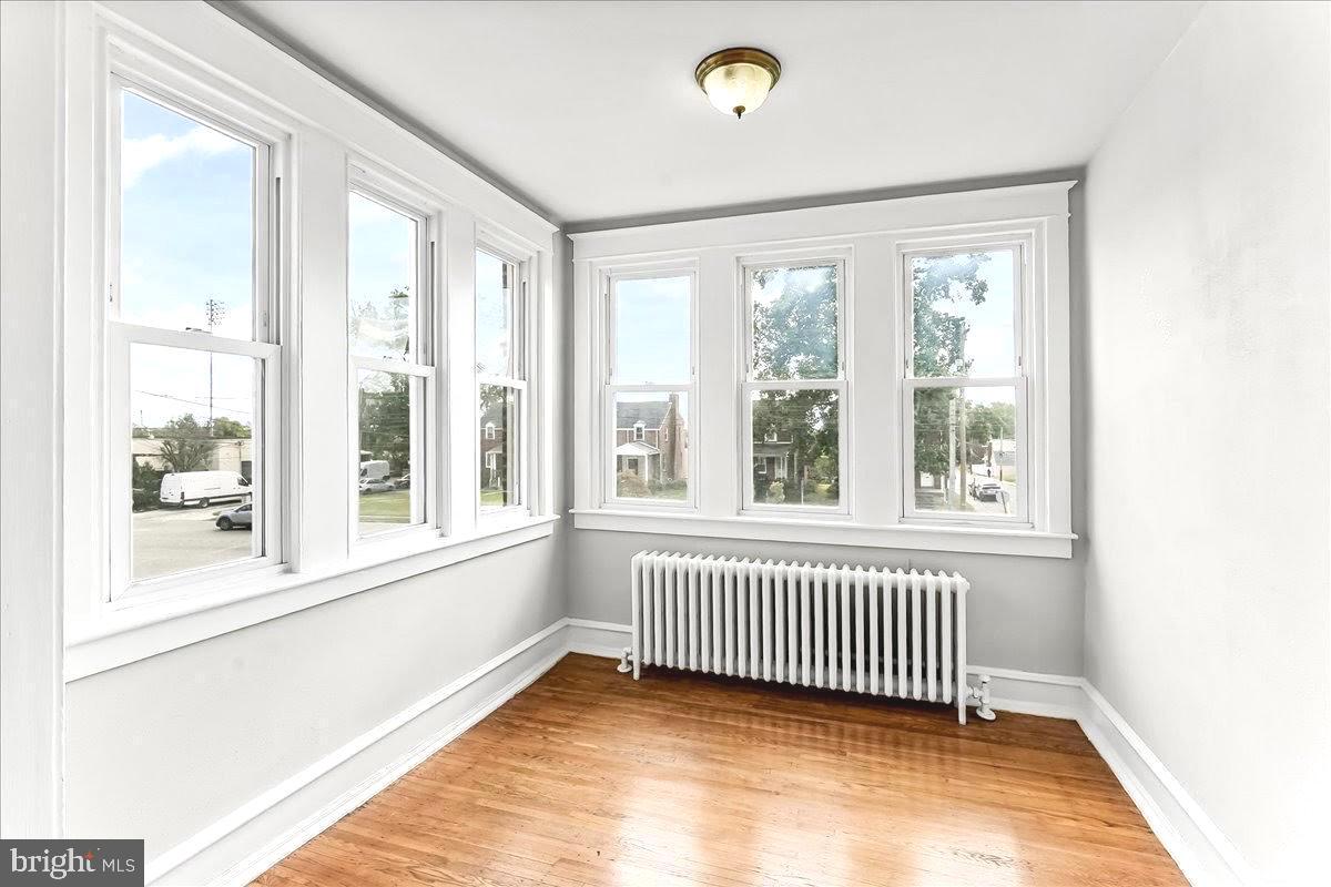 856 Chester Pike, Unit B Sharon Hill, PA 19079 - Photo 4 of 16 a view of empty room with a window