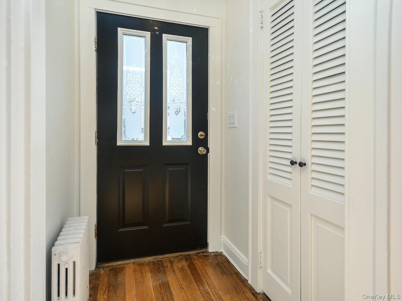 47 Edgewood Road Port Washington, NY 11050 - Photo 2 of 22 an entryway with a hardwood floor