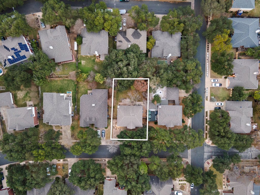 1406 Dapplegrey Lane Austin, TX 78727 - Photo 31 of 38 Aerial view of residential area with property parcel outlined