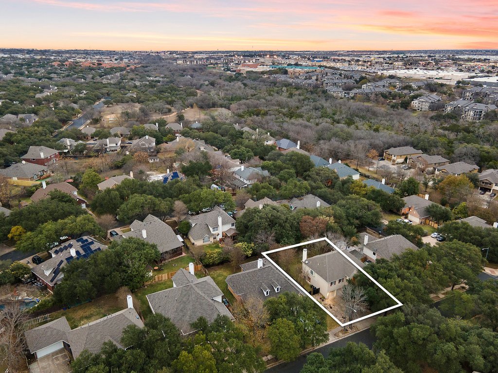 1406 Dapplegrey Lane Austin, TX 78727 - Photo 34 of 38 Aerial view at dusk of a residential view and property parcel outlined