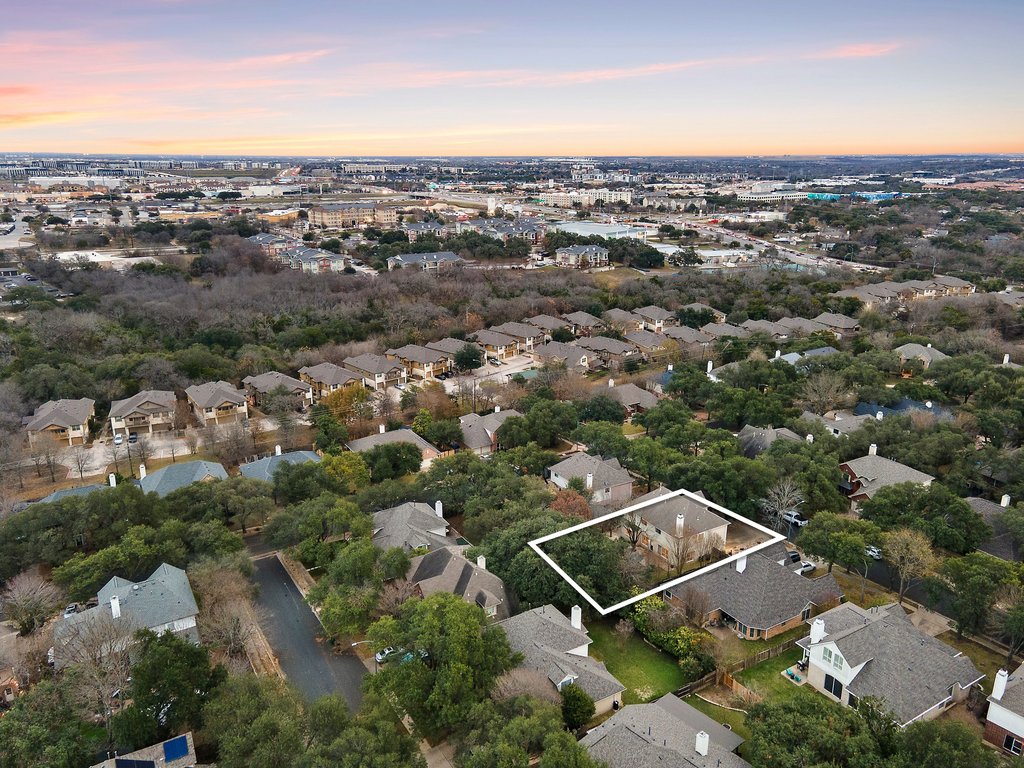 1406 Dapplegrey Lane Austin, TX 78727 - Photo 36 of 38 Aerial perspective of suburban area with property boundaries highlighted