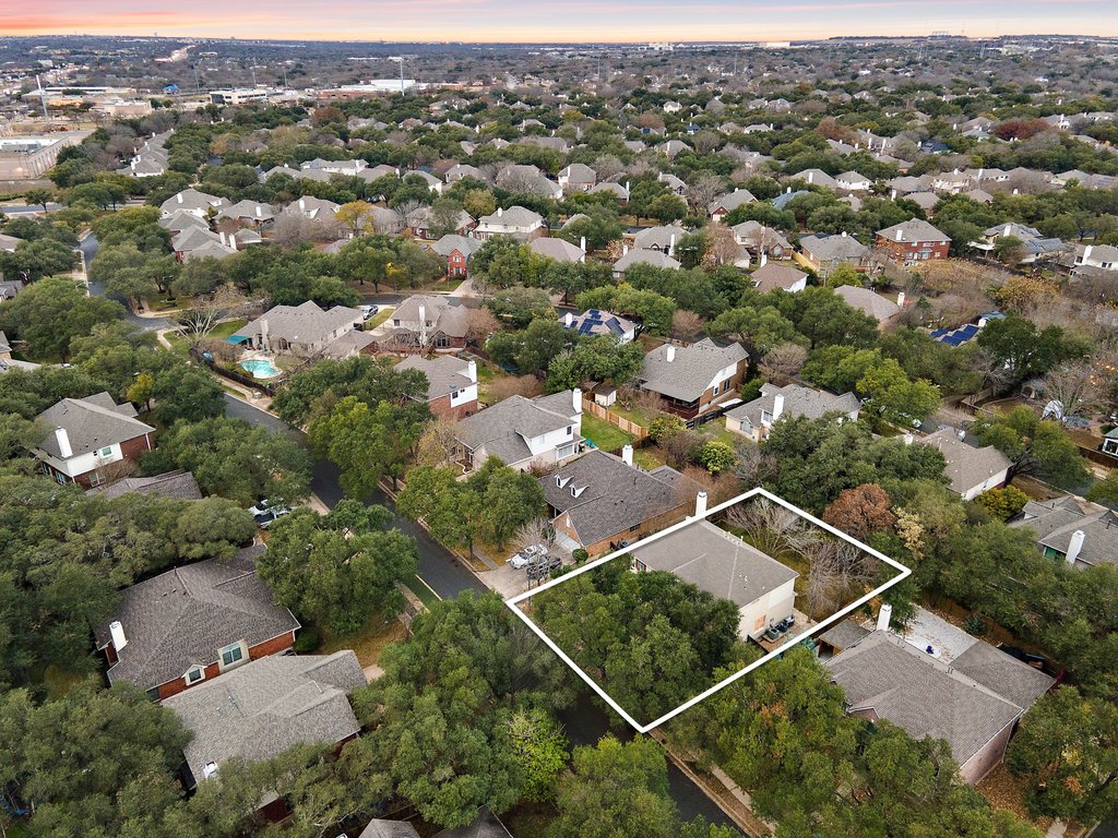 1406 Dapplegrey Lane Austin, TX 78727 - Photo 37 of 38 Aerial view of residential area with property parcel outlined