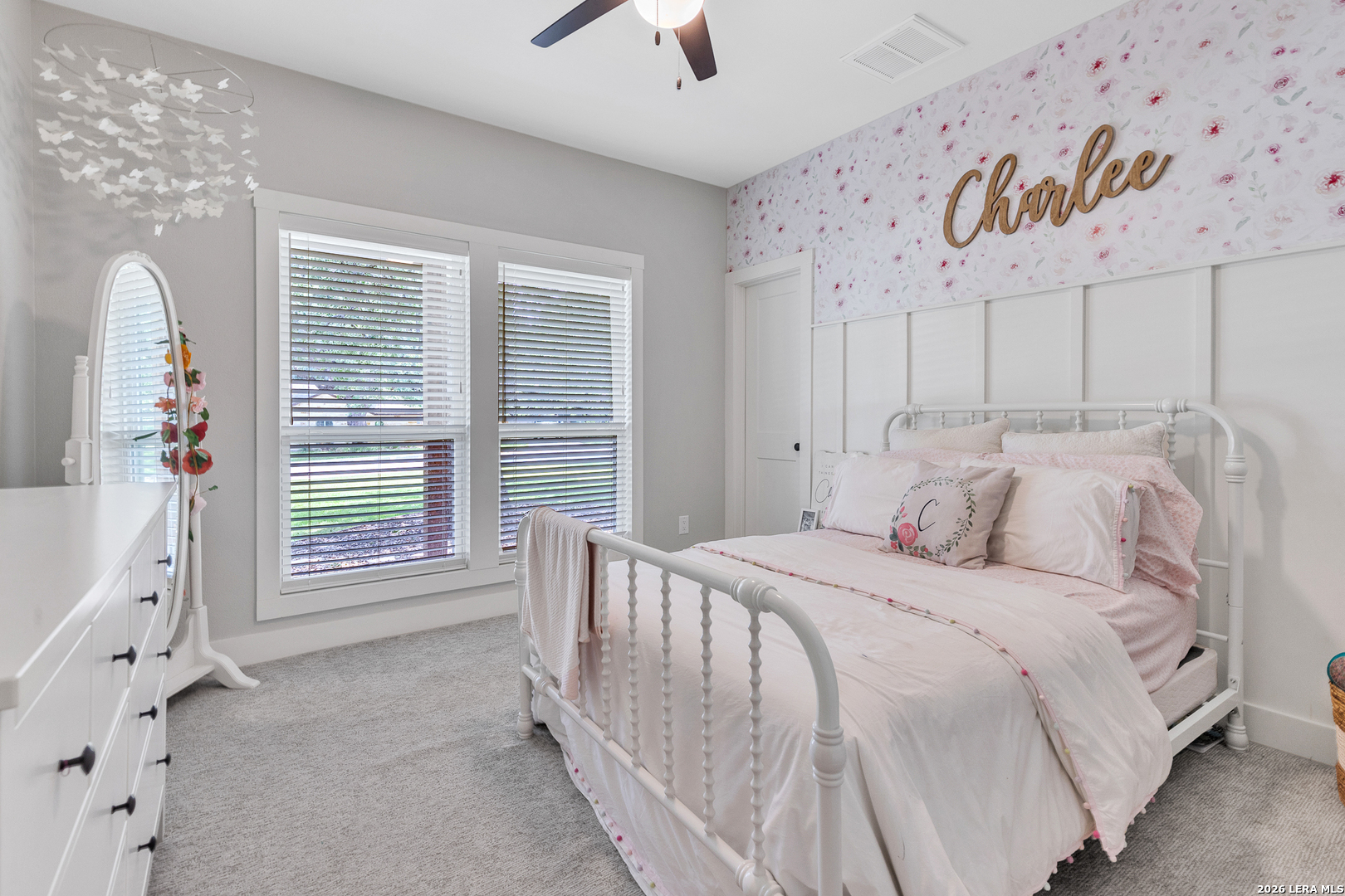 1026 Timbercrest Pleasanton, TX 78064 - Photo 20 of 37 a bedroom with a bed and a window