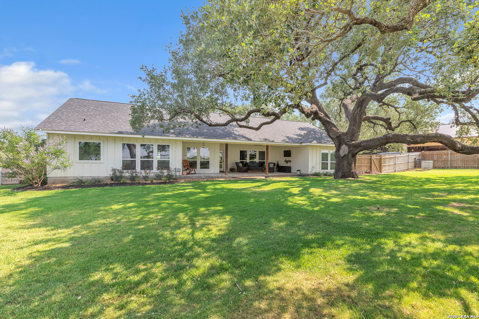 1026 Timbercrest Pleasanton, TX 78064 - Photo 30 of 37 a front view of a house with a garden