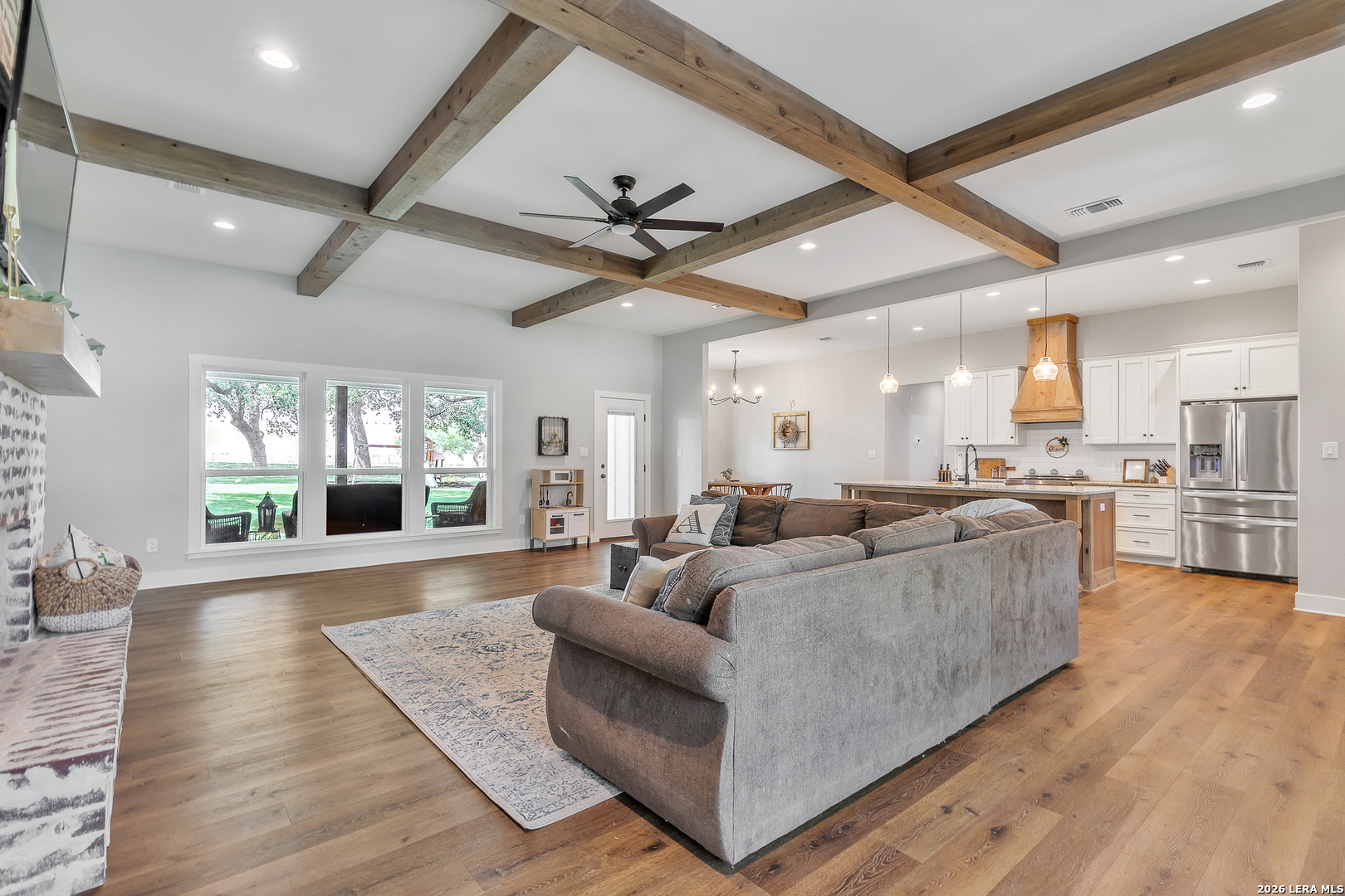 1026 Timbercrest Pleasanton, TX 78064 - Photo 3 of 37 a living room with furniture wooden floor and a large window