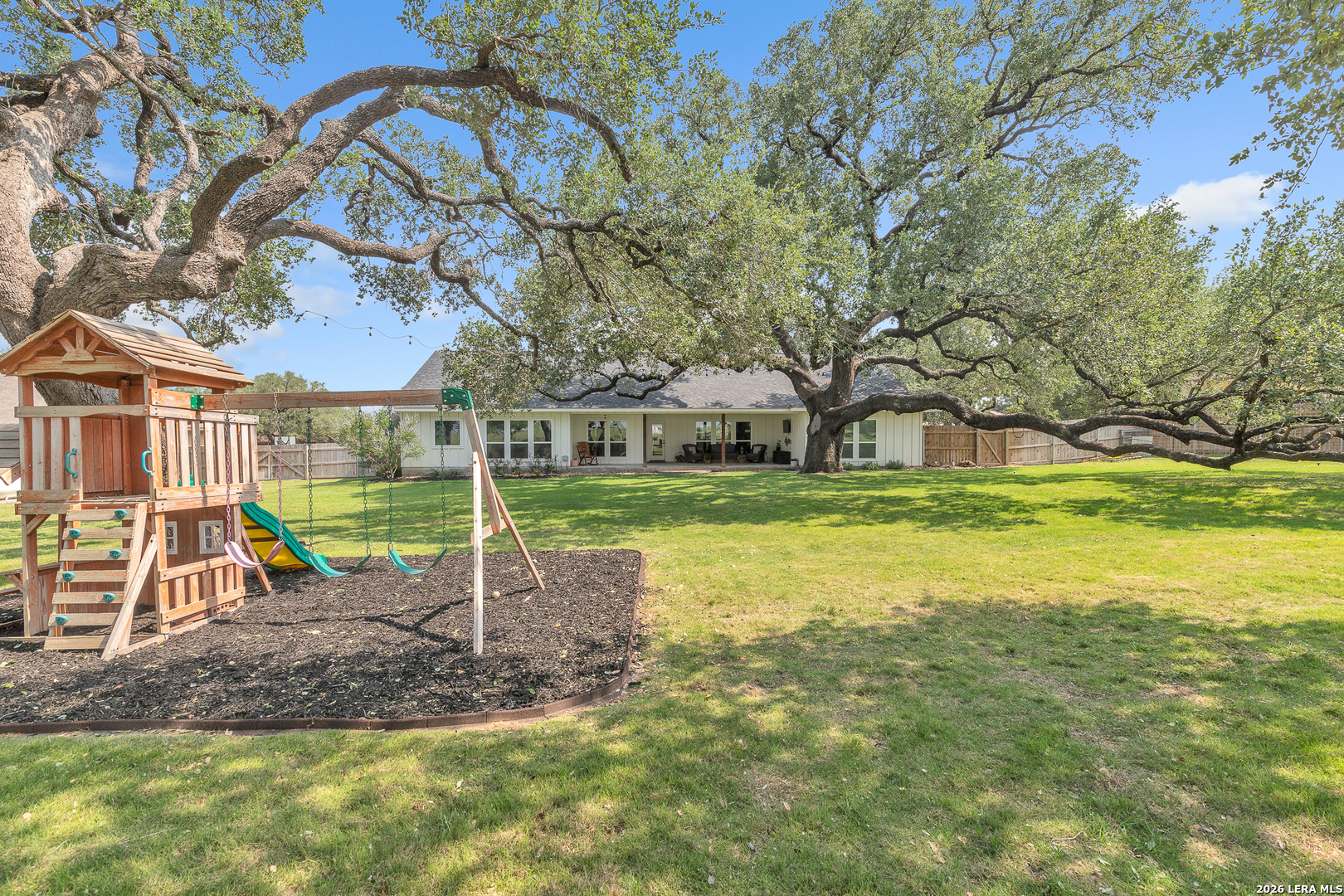 1026 Timbercrest Pleasanton, TX 78064 - Photo 32 of 37 a view of a house with a yard
