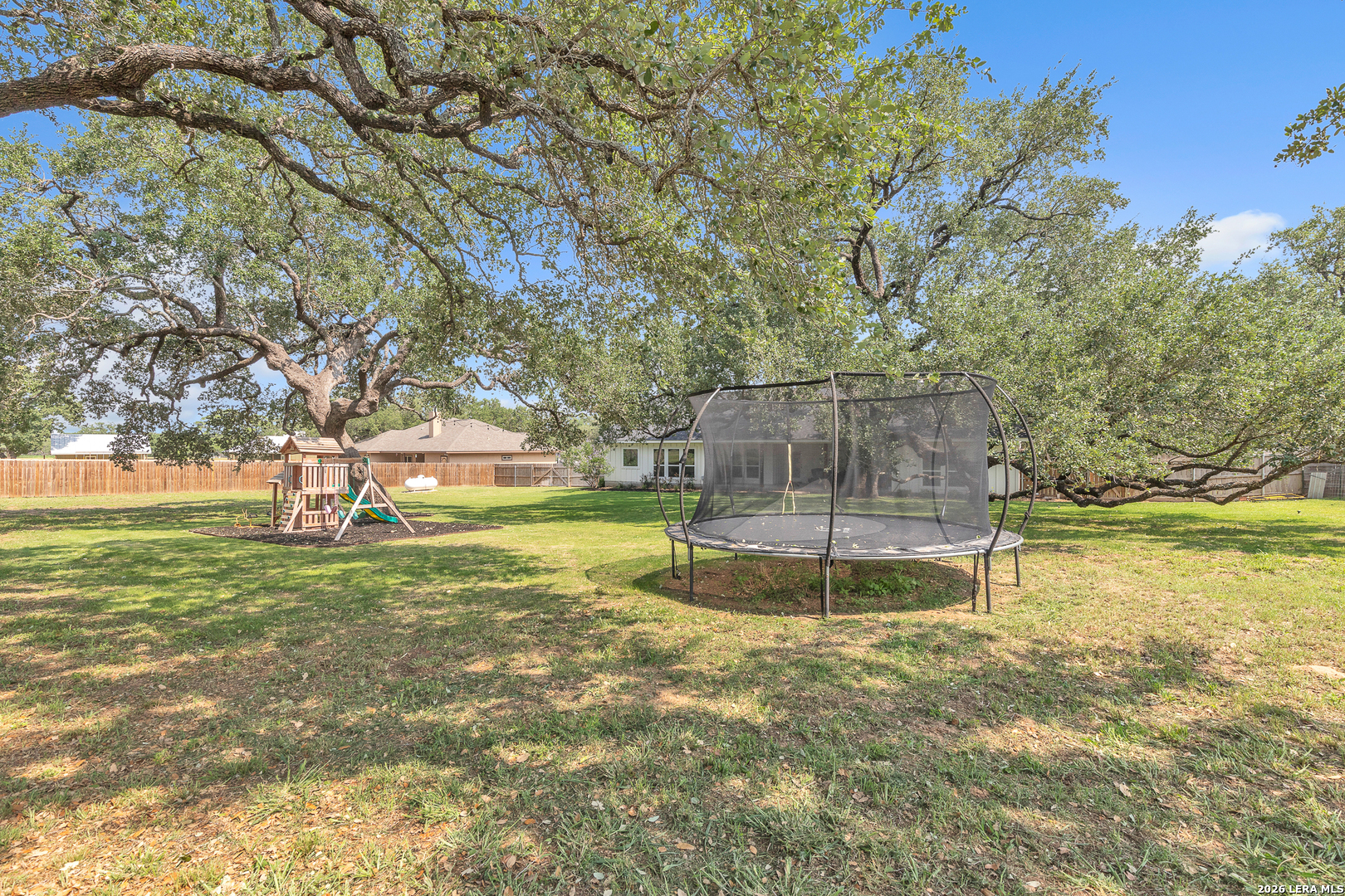 1026 Timbercrest Pleasanton, TX 78064 - Photo 33 of 37 front view of a house with a yard