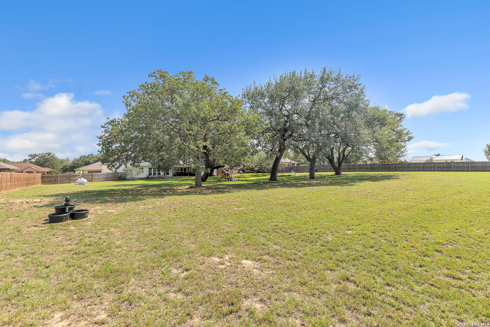 1026 Timbercrest Pleasanton, TX 78064 - Photo 36 of 37 a view of a swimming pool and lake