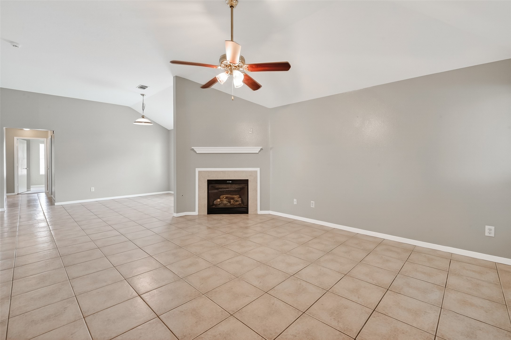 1118 Chestnut Bough Street Channelview, TX 77530 - Photo 6 of 39 Spacious Family Room Open to Formal Dining Area with a cozy fireplace