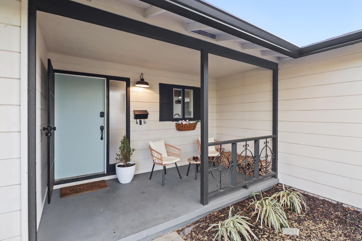 5208 Rambler Way Sacramento, CA 95841 - Photo 13 of 51 a view of a hallway with wooden floor and dining room view