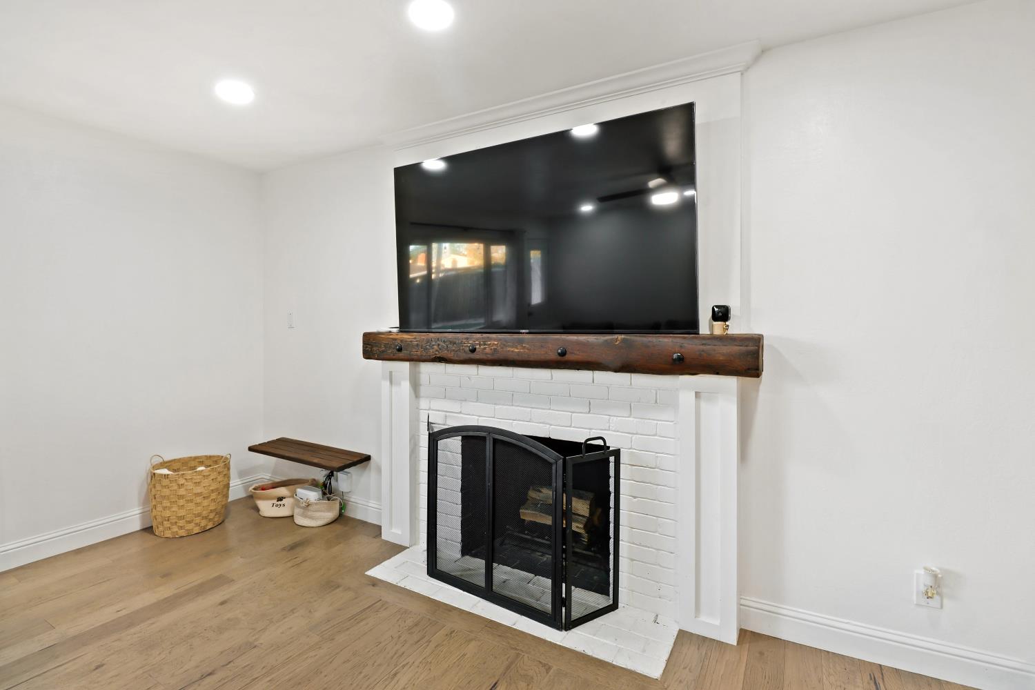 5208 Rambler Way Sacramento, CA 95841 - Photo 15 of 51 a living room with furniture and a fireplace