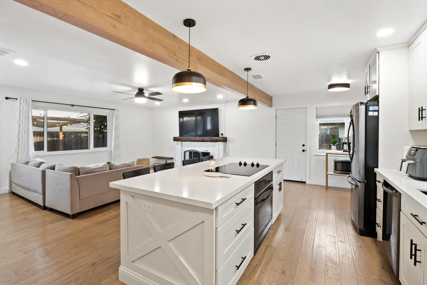 5208 Rambler Way Sacramento, CA 95841 - Photo 29 of 51 a view of living room with furniture and flat screen tv