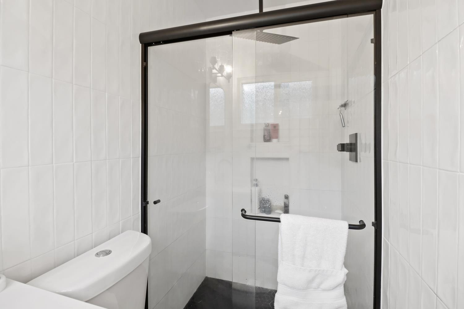 5208 Rambler Way Sacramento, CA 95841 - Photo 34 of 51 a bathroom with a shower and a sink