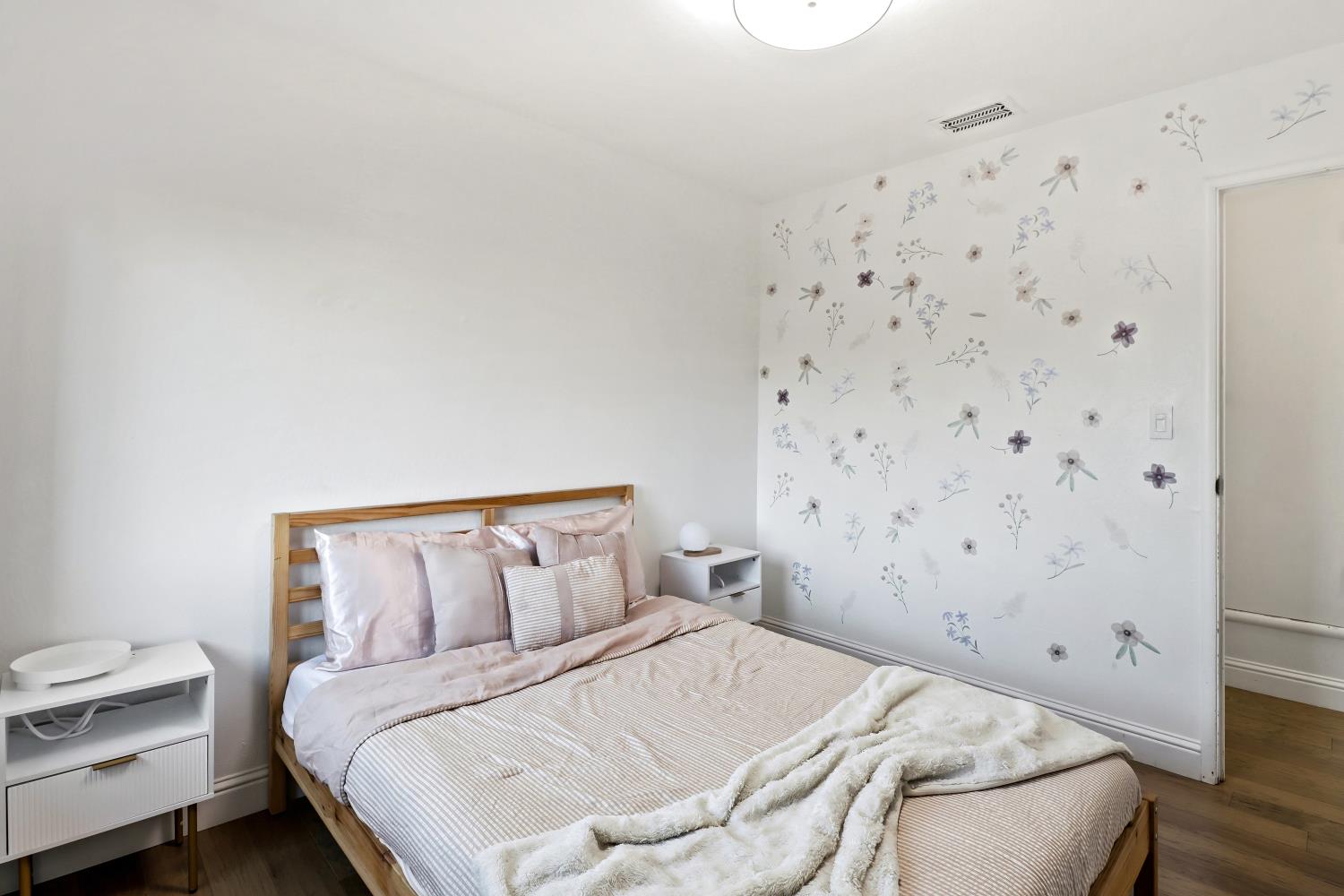 5208 Rambler Way Sacramento, CA 95841 - Photo 36 of 51 a bedroom with a bed and curtain