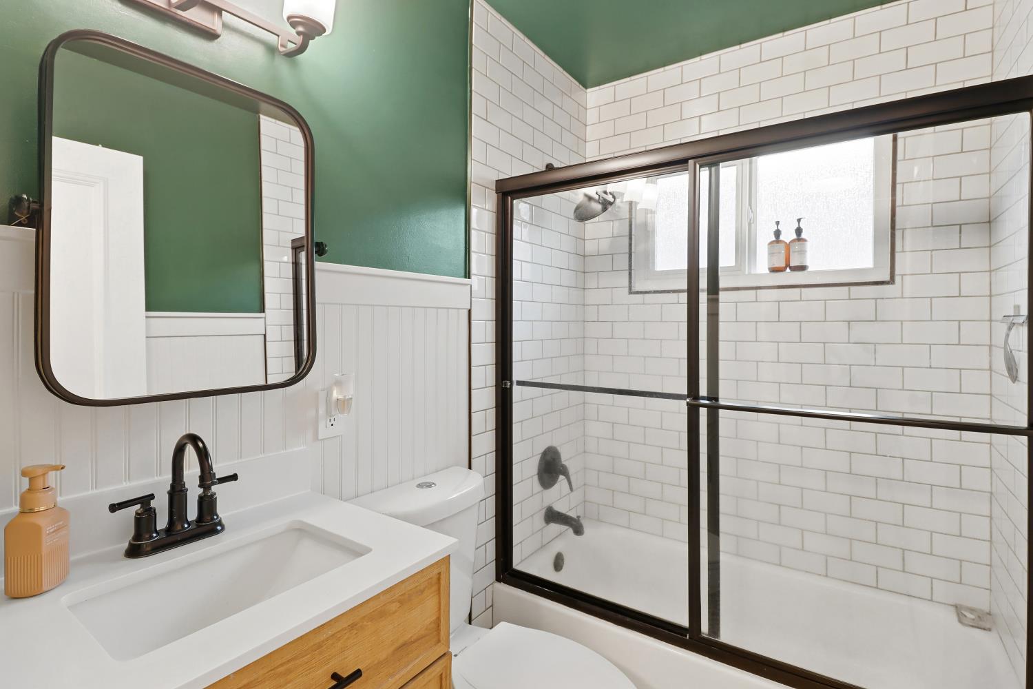 5208 Rambler Way Sacramento, CA 95841 - Photo 37 of 51 a bathroom with a sink and a mirror