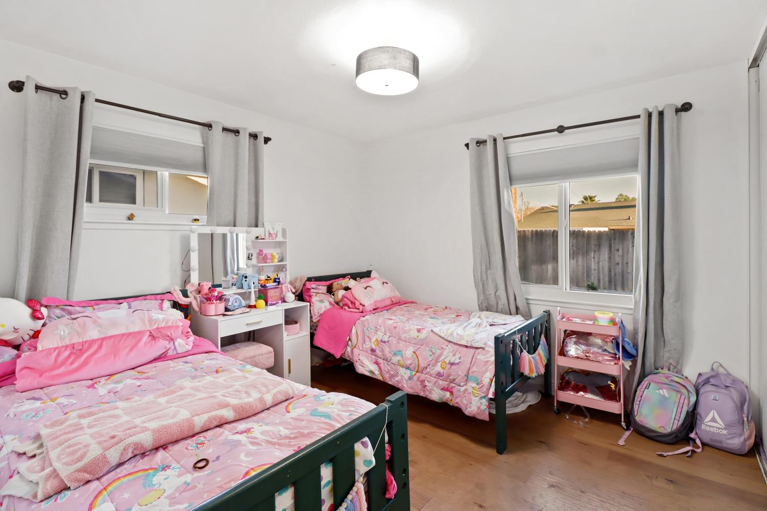 5208 Rambler Way Sacramento, CA 95841 - Photo 39 of 51 a bedroom with a bed and a mirror