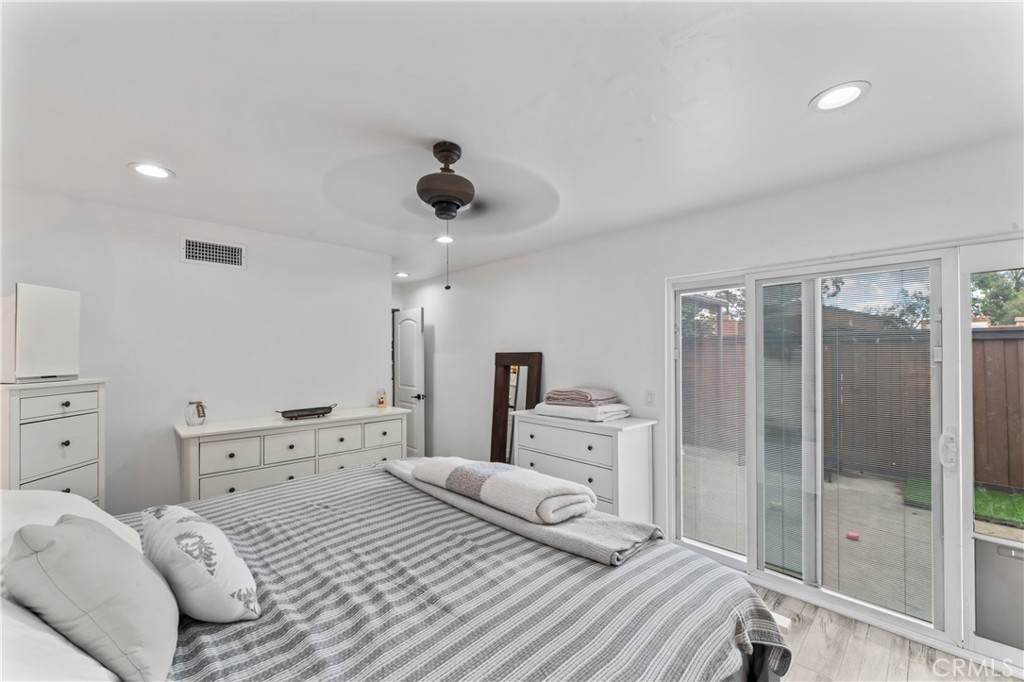 14456 Foothill, Unit 47 Sylmar, CA 91342 - Photo 15 of 26 a bedroom with a bed and a window