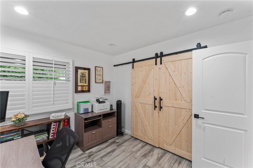 14456 Foothill, Unit 47 Sylmar, CA 91342 - Photo 21 of 26 a bedroom with a bed and a window