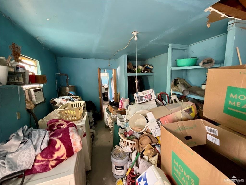 5146 Jm Martinez Street, Unit J Rio Grande City, TX 78582 - Photo 12 of 13 a living room with furniture and a flat screen tv
