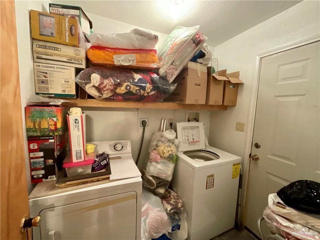 5146 Jm Martinez Street, Unit J Rio Grande City, TX 78582 - Photo 10 of 13 a utility room with dryer washer and other items
