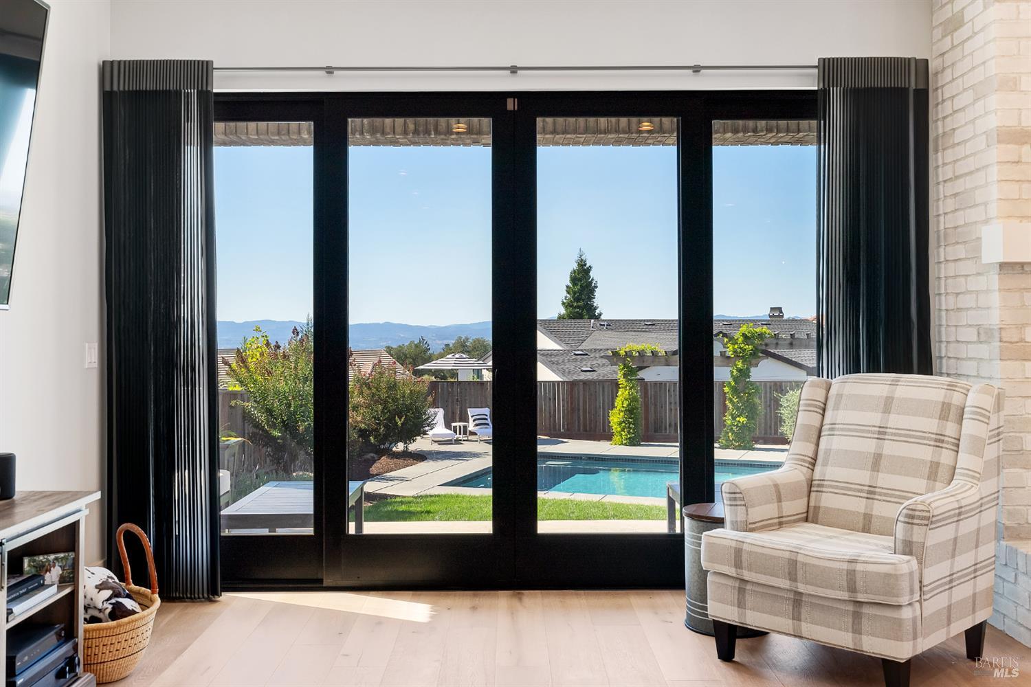 3724 Stanhope Court Santa Rosa, CA 95404 - Photo 12 of 78 a living room with couch and a floor to ceiling window