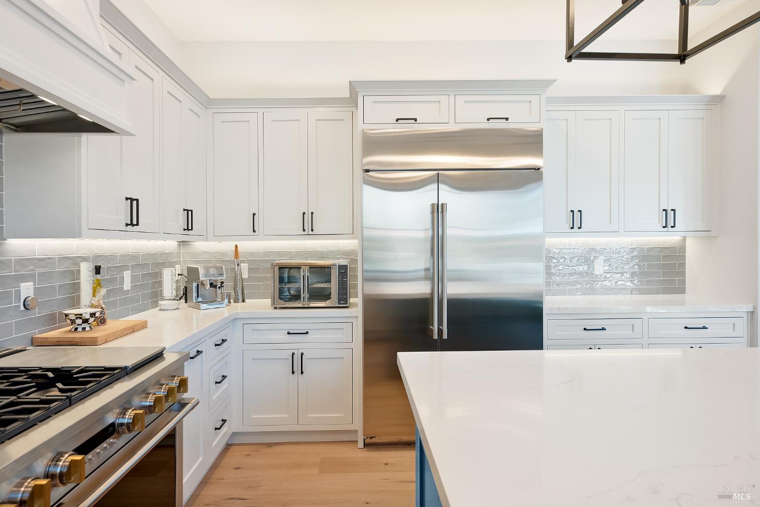 3724 Stanhope Court Santa Rosa, CA 95404 - Photo 18 of 78 a kitchen with stainless steel appliances a refrigerator and a stove