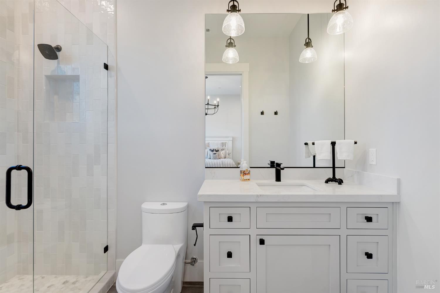 3724 Stanhope Court Santa Rosa, CA 95404 - Photo 28 of 78 a bathroom with a sink vanity mirror and toilet