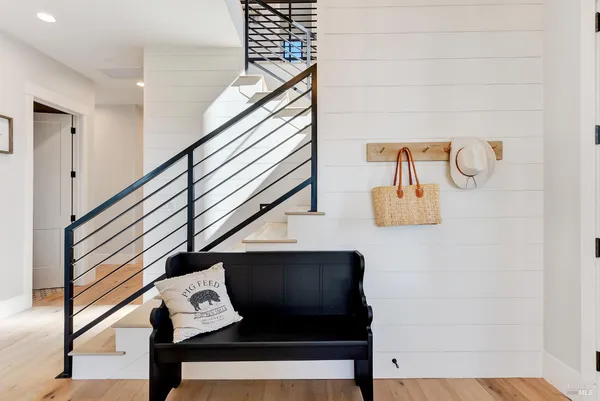 a bedroom with bed and a table