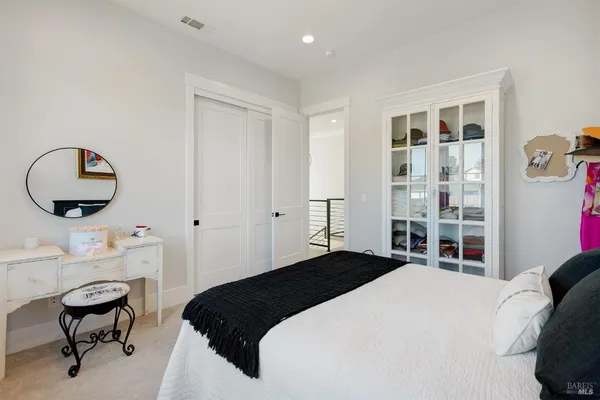 a backyard of a house with outdoor seating