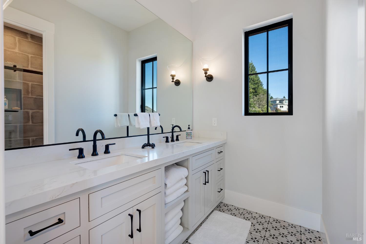 3724 Stanhope Court Santa Rosa, CA 95404 - Photo 48 of 78 a bathroom with a double vanity sink and a mirror